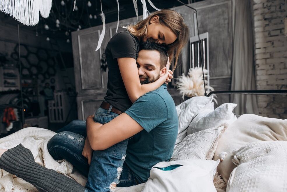 Woman hugging man who increased power.